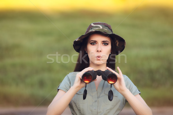 Surprised Explorer Girl with Camouflage Hat and Binoculars  Stock photo © NicoletaIonescu