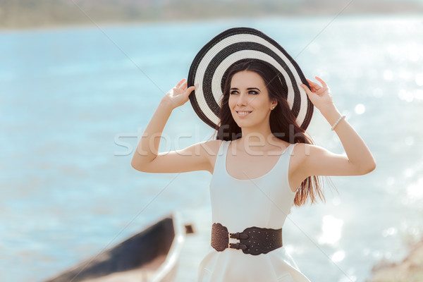 Summer Woman with Big Stripes Beach Hat  Stock photo © NicoletaIonescu