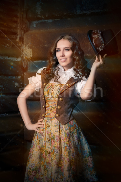 Steampunk Girl with Top Hat and Aviator Glasses  Stock photo © NicoletaIonescu