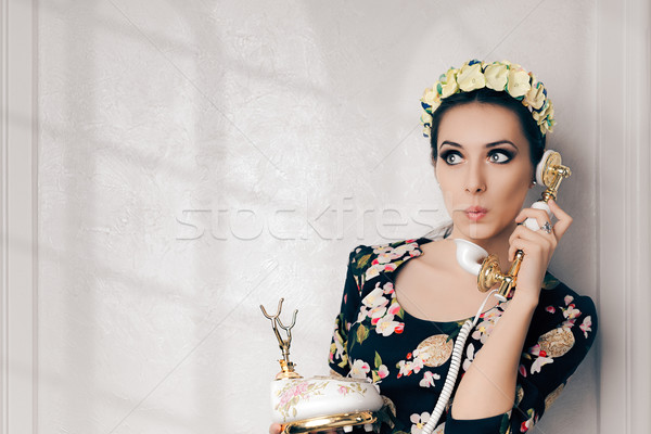 Surprised Retro Woman With Vintage Phone Stock photo © NicoletaIonescu