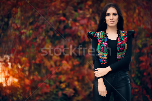 Happy Autumn Woman Wearing Colorful Ethnic Vest  Stock photo © NicoletaIonescu