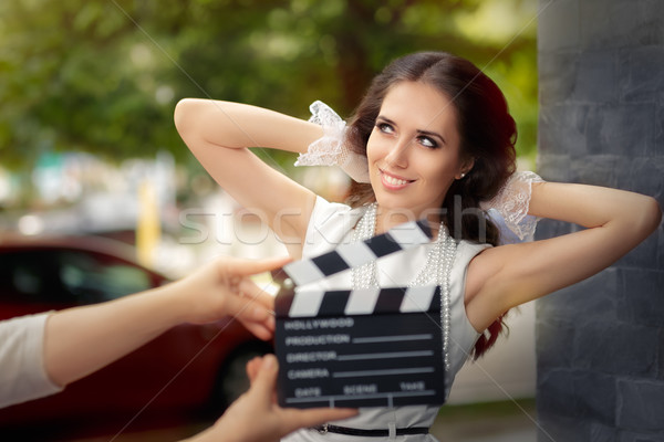 Happy Elegant Woman Ready for a Shoot Stock photo © NicoletaIonescu