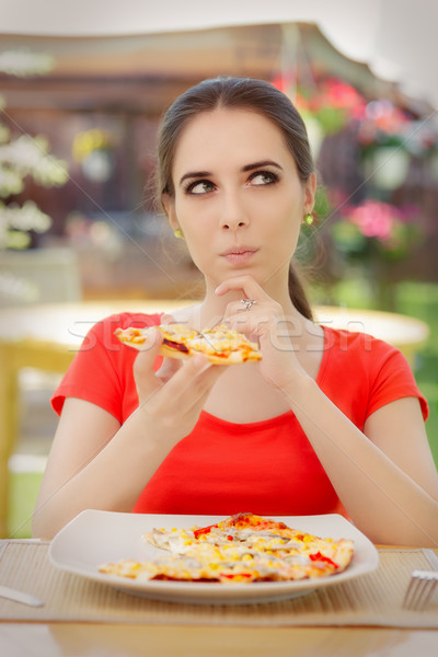 Young Woman Thinking About Eating Pizza on a Diet  Stock photo © NicoletaIonescu