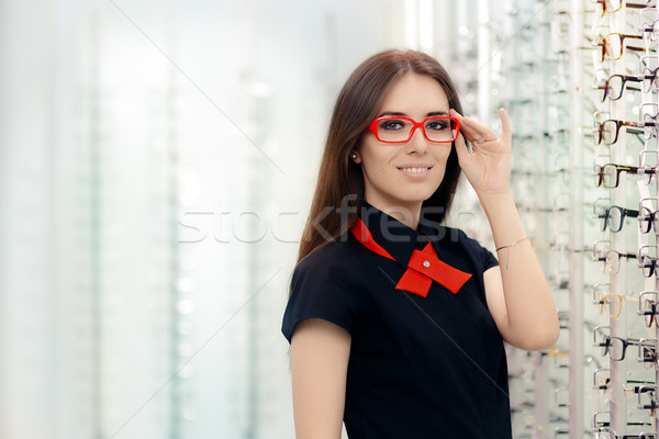 Fashion Woman Wearing Eyeglasses in Medical Optical Shop Stock photo © NicoletaIonescu