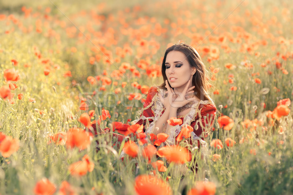 Stock photo: Beautiful Princess in a Field of Poppies 