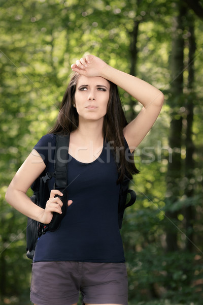Disoriented Hiking Girl with Travel Backpack  Stock photo © NicoletaIonescu