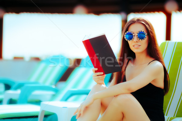 Summer Girl Reading a Book at the Pool Stock photo © NicoletaIonescu