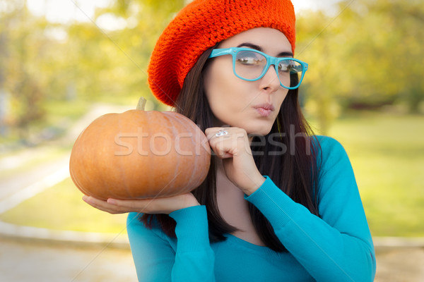Vicces nő visel szemüveg tart sütőtök Stock fotó © NicoletaIonescu