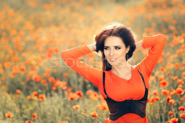 Mujer hermosa campo amapolas retrato niña feliz rojo Foto stock © NicoletaIonescu