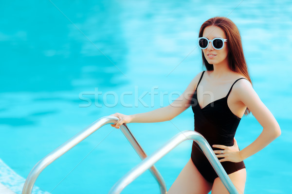 Summer Girl with Fashion Sunglasses and Black Swimsuit by the Pool Stock photo © NicoletaIonescu