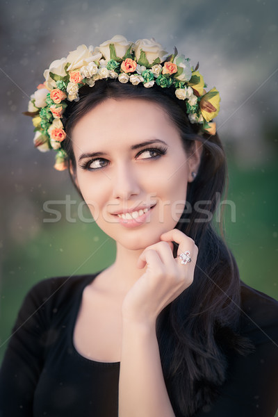 Portrait of a Happy Girl with Floral Wreath Outside Stock photo © NicoletaIonescu