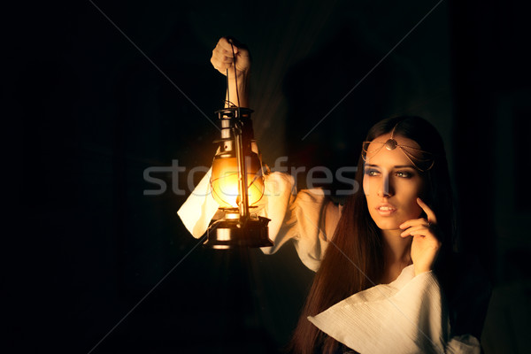 Beautiful Medieval Princess Holding Lantern  Stock photo © NicoletaIonescu