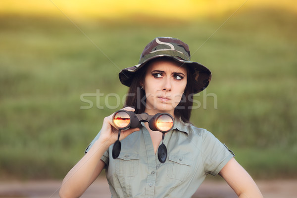 Circumspect Explorer Girl with Camouflage Hat and Binoculars  Stock photo © NicoletaIonescu