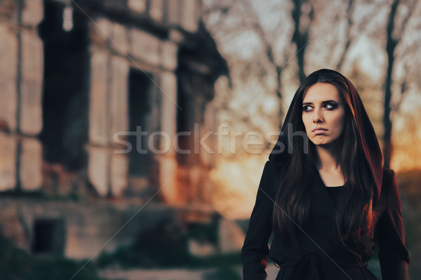 Mysterious Evil Vampire in Front of a Horror Abandoned House Stock photo © NicoletaIonescu