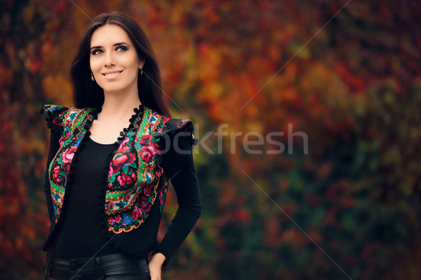 Happy Autumn Woman Wearing Colorful Ethnic Vest  Stock photo © NicoletaIonescu