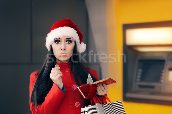 Funny Christmas Woman Holding a Coin  Stock photo © NicoletaIonescu