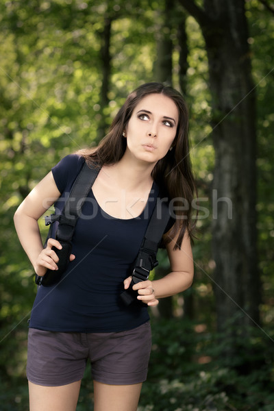 Disoriented Hiking Girl with Travel Backpack  Stock photo © NicoletaIonescu