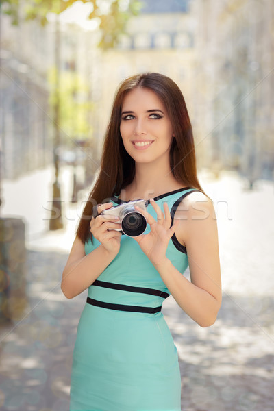 Happy Elegant Woman with Compact Digital Camera Stock photo © NicoletaIonescu