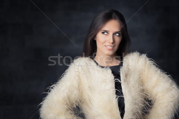 Beautiful Winter Woman Wearing Fur Coat  Stock photo © NicoletaIonescu