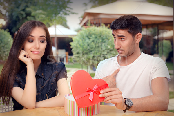 Girl Disappointed on Her Valentine Gift From Boyfriend Stock photo © NicoletaIonescu