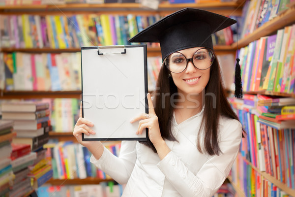 Happy School Student Holding Blank Clipboard Stock photo © NicoletaIonescu