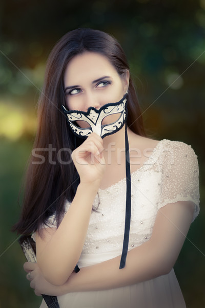Mulher jovem vestido branco máscara retrato belo Foto stock © NicoletaIonescu