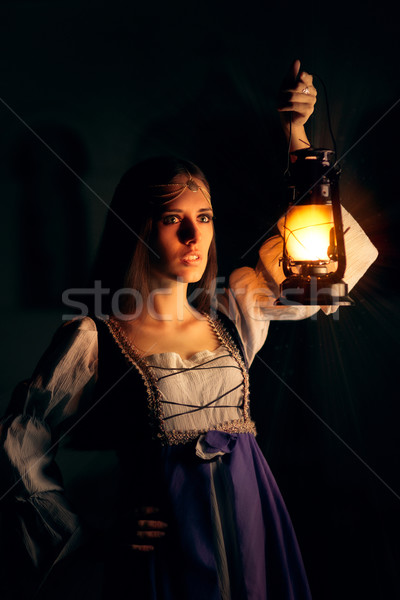 Beautiful Medieval Princess Holding Lantern  Stock photo © NicoletaIonescu