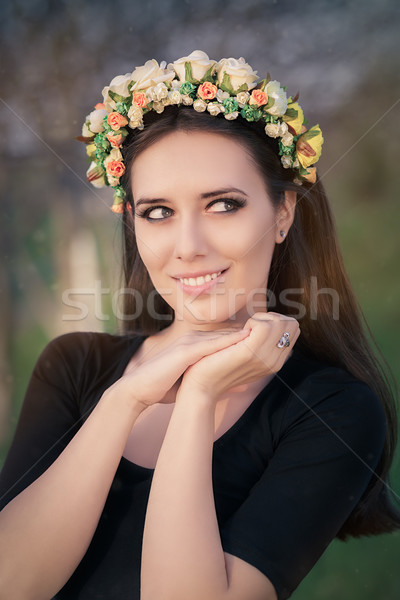 Portrait of a Happy Girl with Floral Wreath Outside Stock photo © NicoletaIonescu
