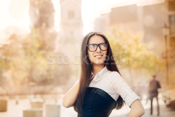 Stock photo: Young Woman with Glasses Out in the City 
