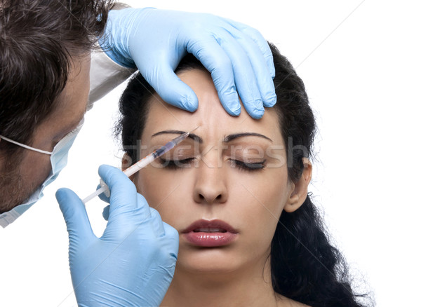 Vrouw spuit behandeling botox collageen handen Stockfoto © NikiLitov