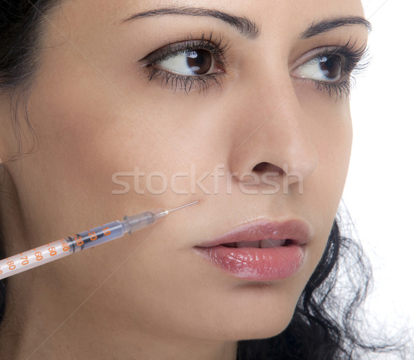 Femeie seringă tratament botox femei Imagine de stoc © NikiLitov