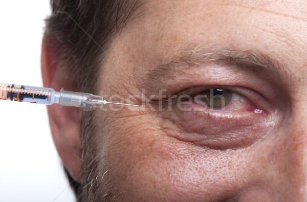 Om seringă tratament botox frumuseţe Imagine de stoc © NikiLitov