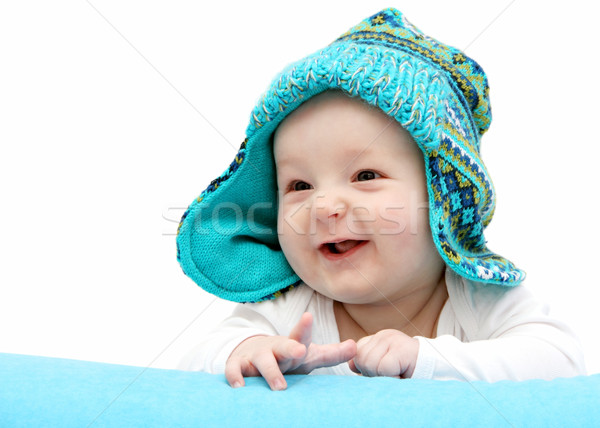 Feliz bebé de punto sombrero estómago mano Foto stock © nikkos