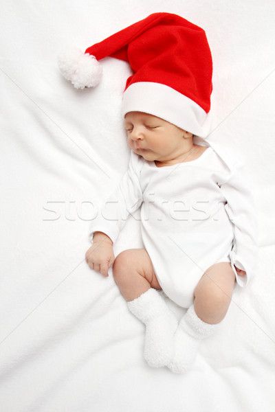 Bebé papá noel sombrero dormir cama cara Foto stock © nikkos
