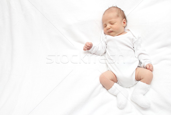 Dormir bebé atrás blanco cama ojo Foto stock © nikkos
