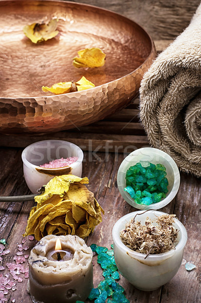 bronze bowl with water and accessories spa treatments Stock photo © nikolaydonetsk