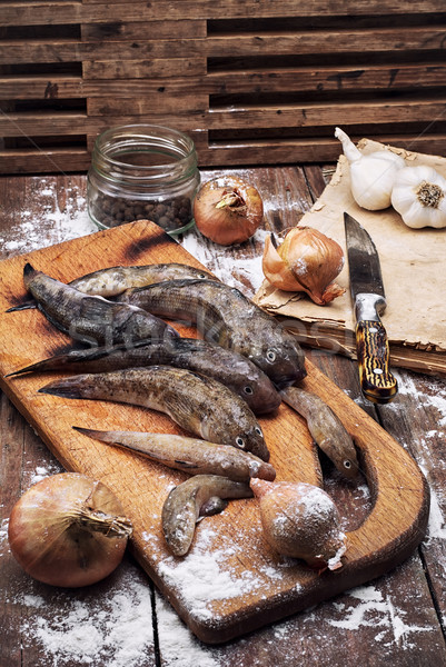 raw fish on the table cooks Stock photo © nikolaydonetsk