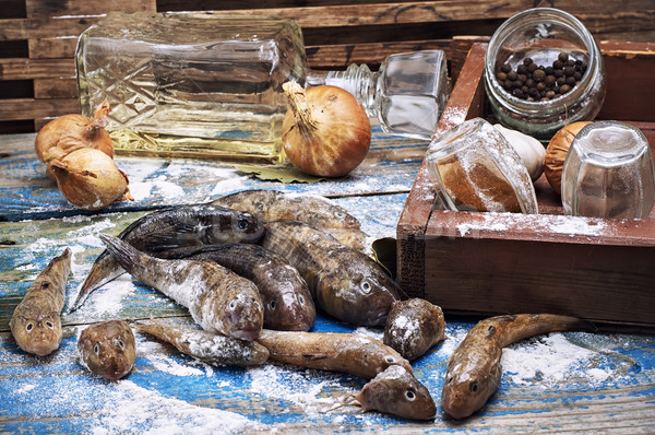 catch fish breed like in the metal plate on the table before cooking Stock photo © nikolaydonetsk