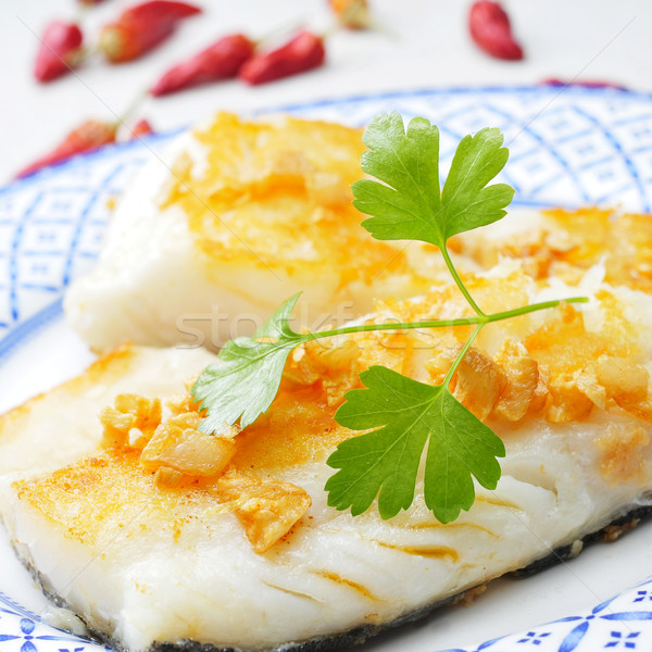 bacalao al ajillo, a typical spanish recipe of codfish Stock photo © nito