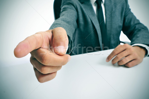 man in suit pointing with the finger the way out Stock photo © nito