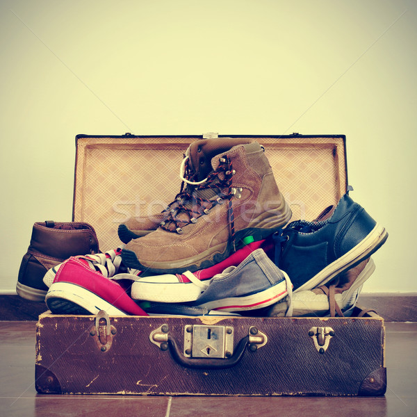 shoes in an old suitcase Stock photo © nito