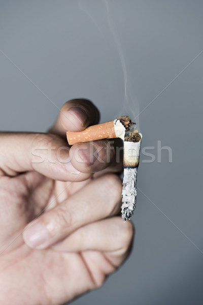 young man quitting smoking Stock photo © nito