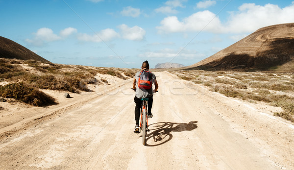 man riding a bike in La Graciosa, Canary Islands, Spain Stock photo © nito