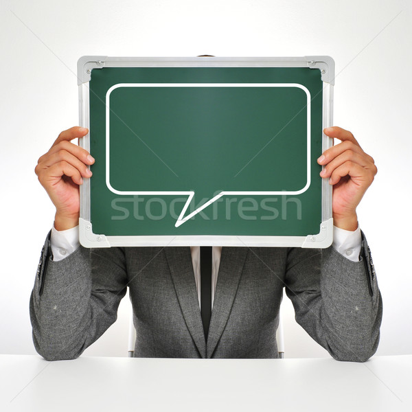 Stock photo: man in suit with a speech balloon