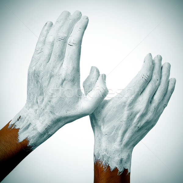 Colomba pace mani uomo verniciato bianco Foto d'archivio © nito