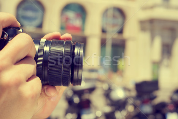 man taking a picture in the street, with a filter effect Stock photo © nito