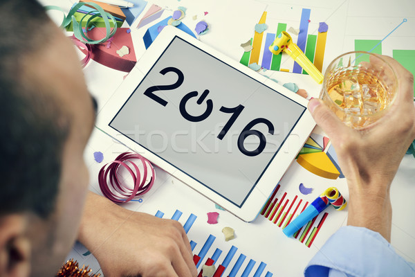 businessman celebrating the new year in his office Stock photo © nito