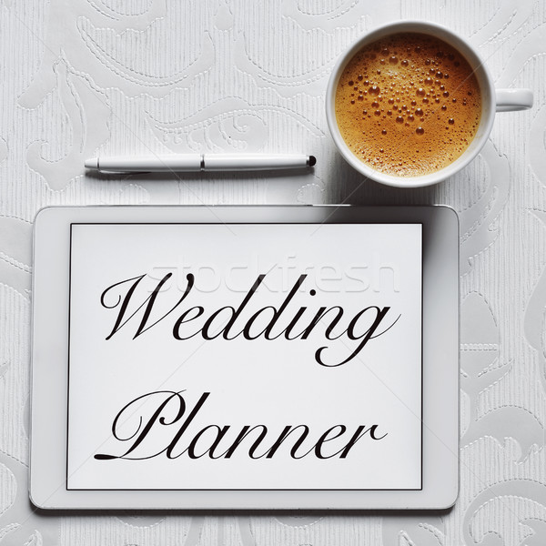 text wedding planner in a tablet computer Stock photo © nito