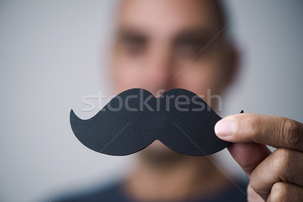 young man with a fake moustache Stock photo © nito