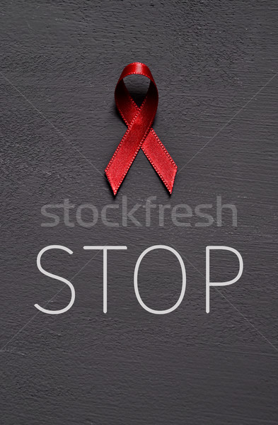word stop and red awareness ribbon Stock photo © nito